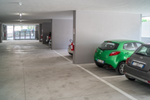 Covered car park with video surveillance, street level 